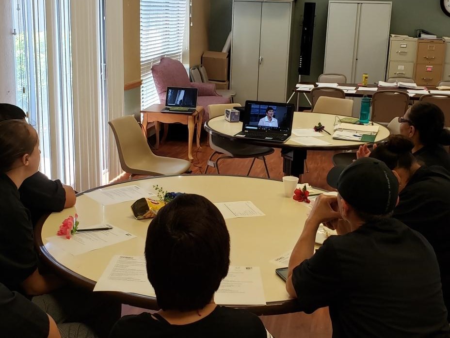 dietary workers watching video